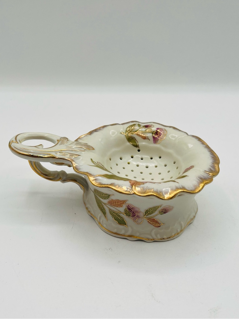 Antique tea strainer With A Matching Drip Bowl Hand Painted Germany